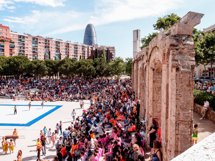 Barcelona, Parc del Clot buildings, antique arches ruins, children sport event spectators, torre agbar